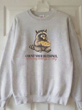 Gildan Ash Grey Thanksgiving Raccoon Deviled Eggs Crewneck Sweatshirt